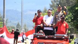 Rayakan Hari Integrasi Papua ke NKRI, Kapolresta Hadiri Giat Pembentangan Bendera Merah Putih Sepanjang 11 KM